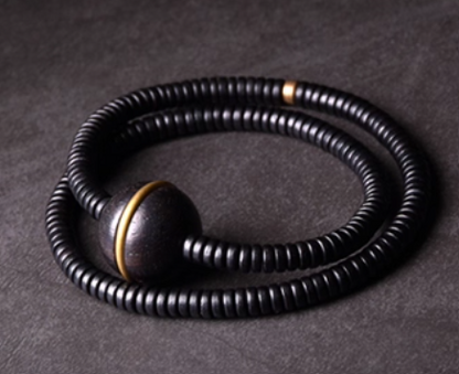 Ebony Wood with a Ball charm