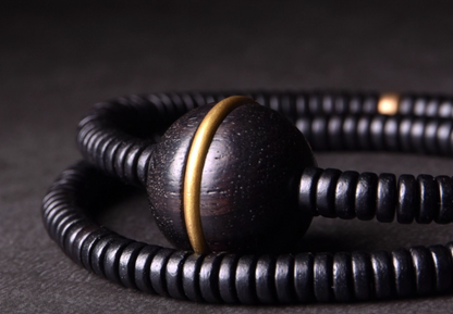 Ebony Wood with a Ball charm